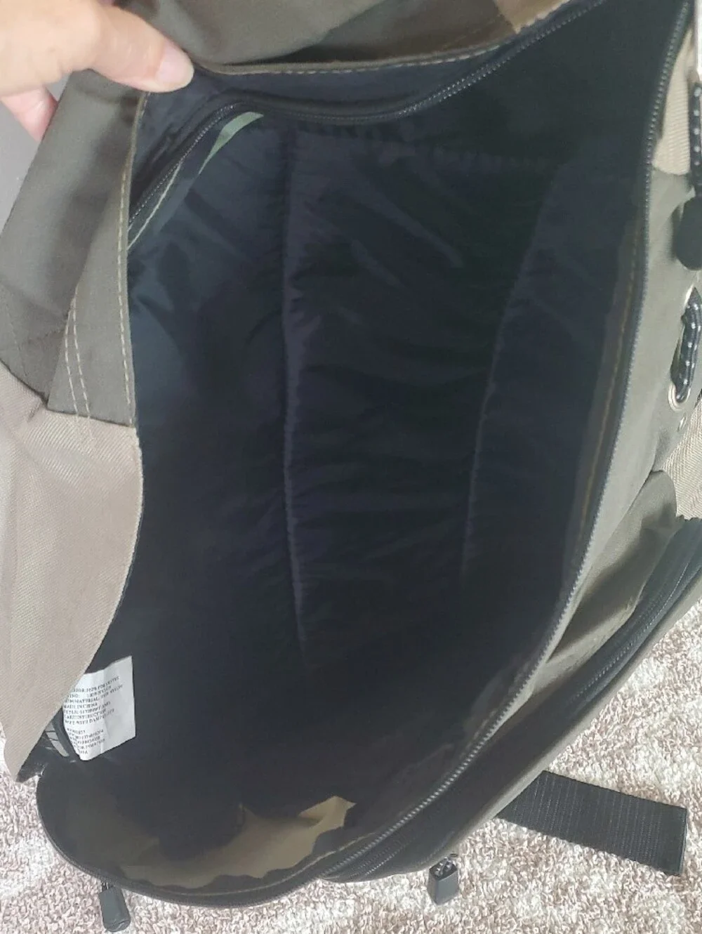 Eastsport Olive and Tan Sling Backpack. Multiple Pockets